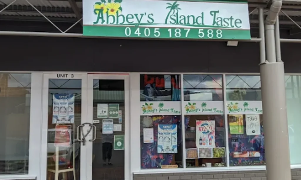 Storefront sign for Abbey's Island Taste in Bonython, Canberra