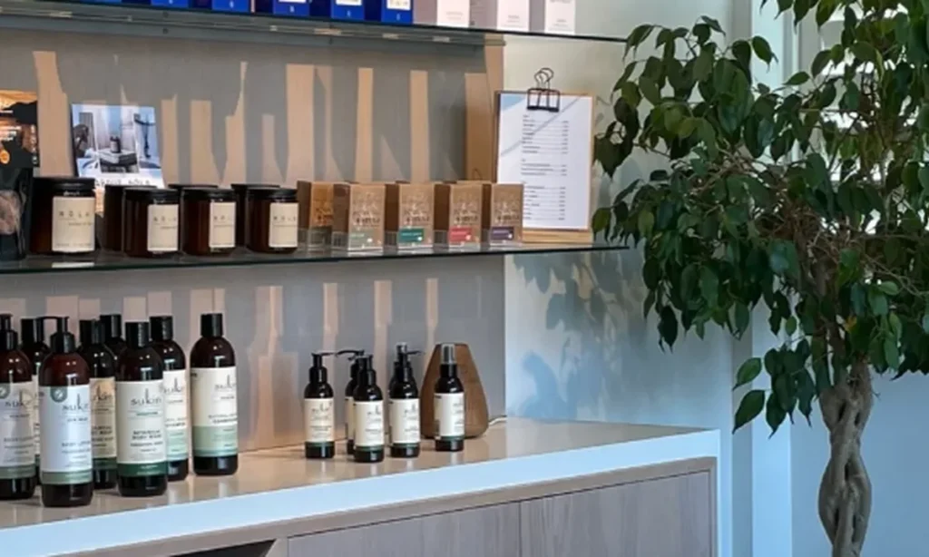 Shelf of wellness products and skincare items at Cloud 9 Float Club in Christchurch